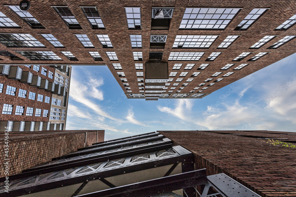 Fototapeta premium Buildings looking up