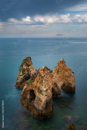 Beautiful seascape at the Ponta Joao de Arens in Portimao, Algarve, Portugal photo