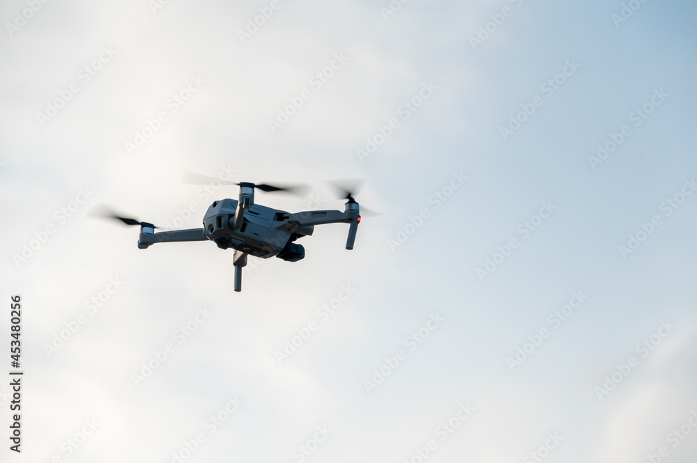 UAV flying in the blue sky UAV flying in the blue sky