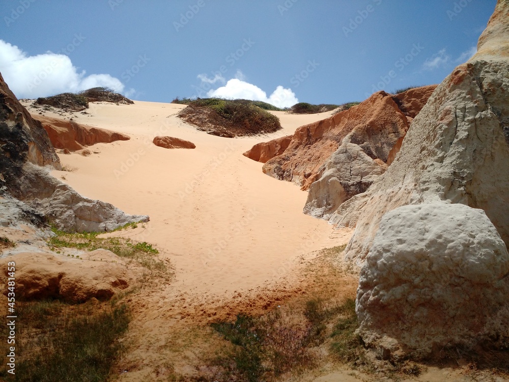 Cliffs at Morro Branco beach, labyrinth and colored sands - Beberibe, Fortaleza, Ceará, Brazil.
