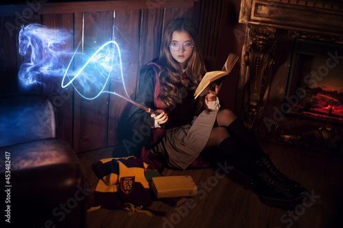 Obraz na płótnie Wizard, Magic Wand, Witch Girl outdoor cast spell, standing behind the castle w salonie