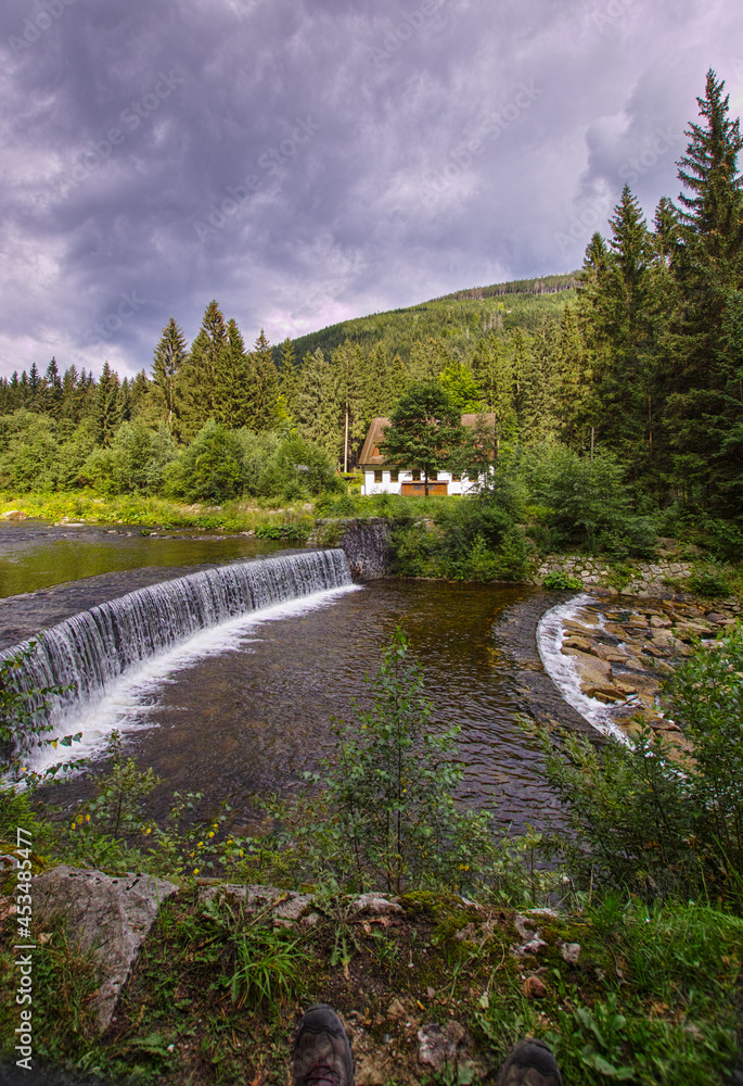 Riverhead of Elbe river in Giant mountains and coats of arms of towns along this river, national park Krkonose in the Czech Republic