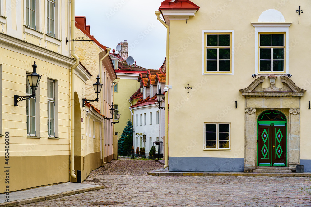 Colorful houses on the cobbled streets of Tallinn, Estonia.