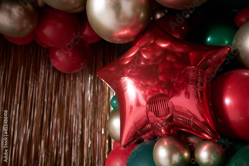 Red star balloon on background from balloons