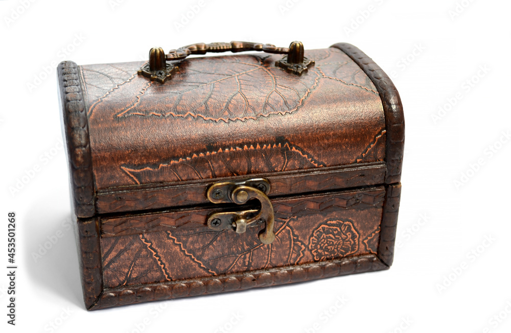 brown wooden chest with drawings on the cover and on the walls brown wooden chest with drawings on the cover and on the walls