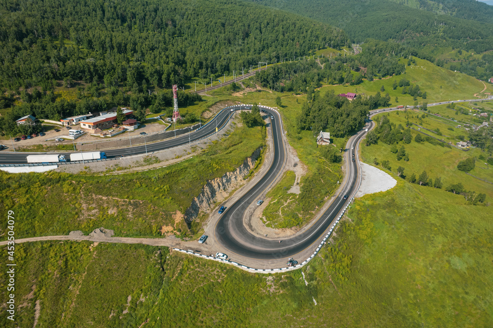 The Baikal serpentine road - aerial view of natural mountain valley with serpantine road, Trans-Siberian Highway, Russia, Kultuk, Slyudyanka