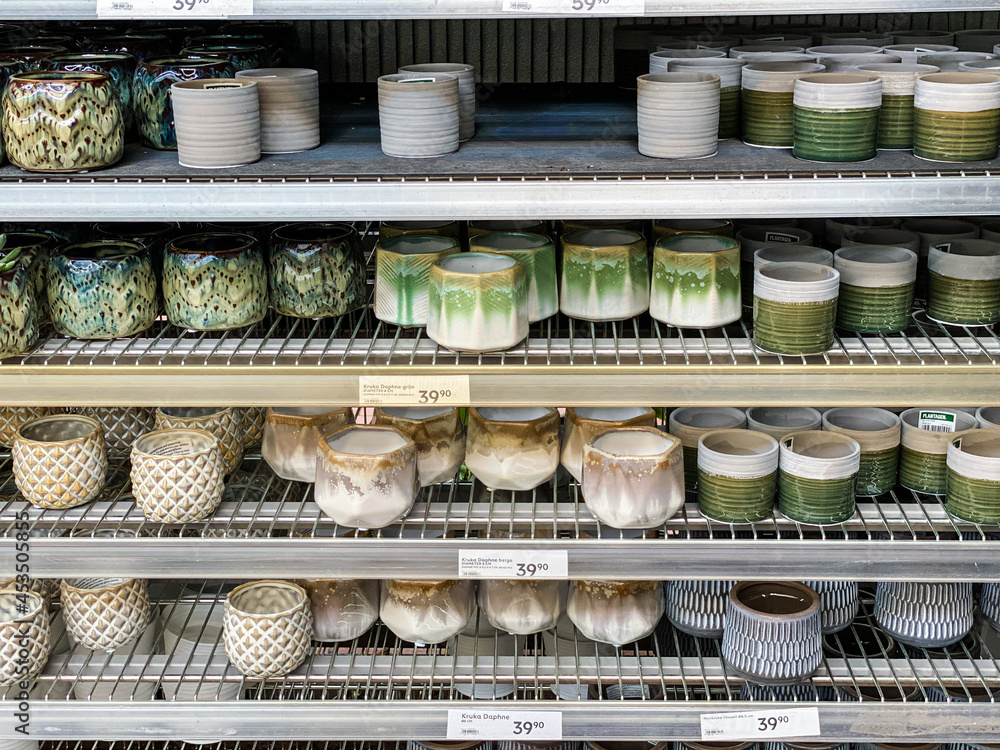 Green and beige flower pots for sale. Green and beige flower pots for sale.
