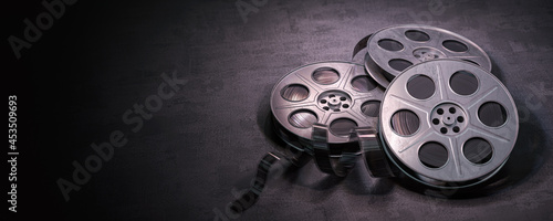 Film reels on black background. Movie, video and cinema prodaction and edition concept.