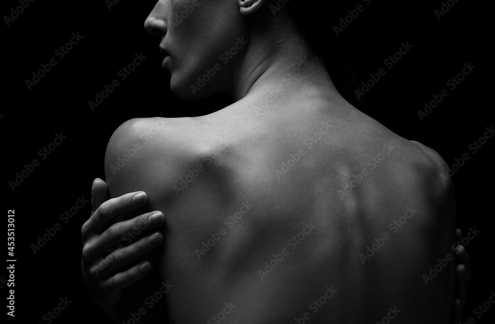 Black-white silhouette of female shoulders and hands . Female silhouette. Black-white silhouette of female shoulders and hands . Female silhouette.