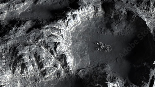 lunar base on the lunar surface as seen from a height of several kilometers. concept of space travel and exploration of distant planets