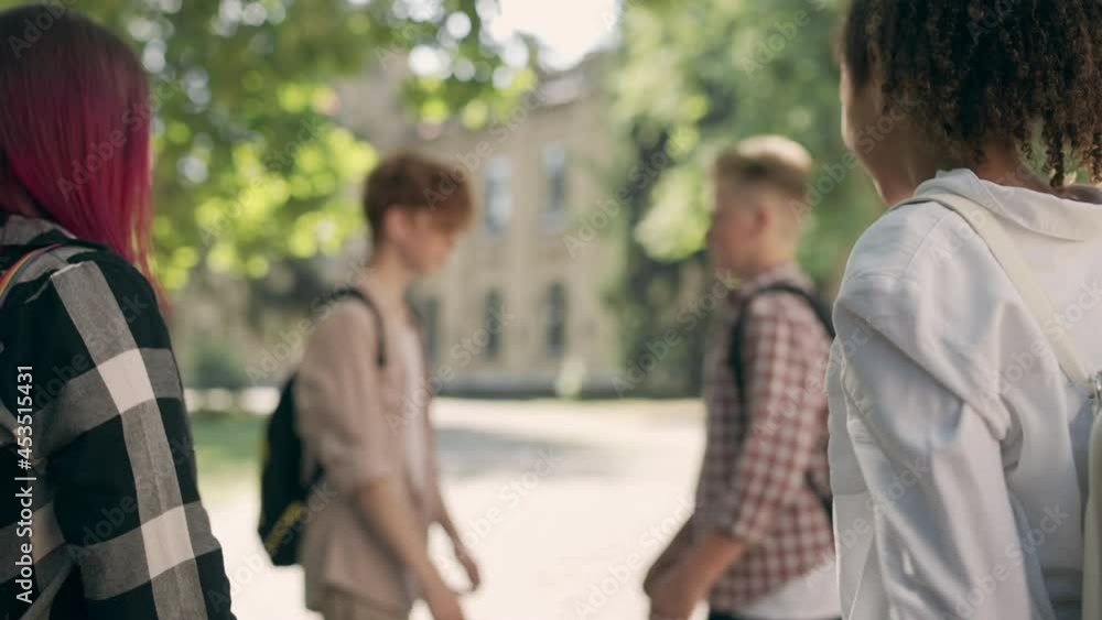 Classmates instigating fight between two angry school boys, bullying problem Classmates instigating fight between two angry school boys, bullying problem