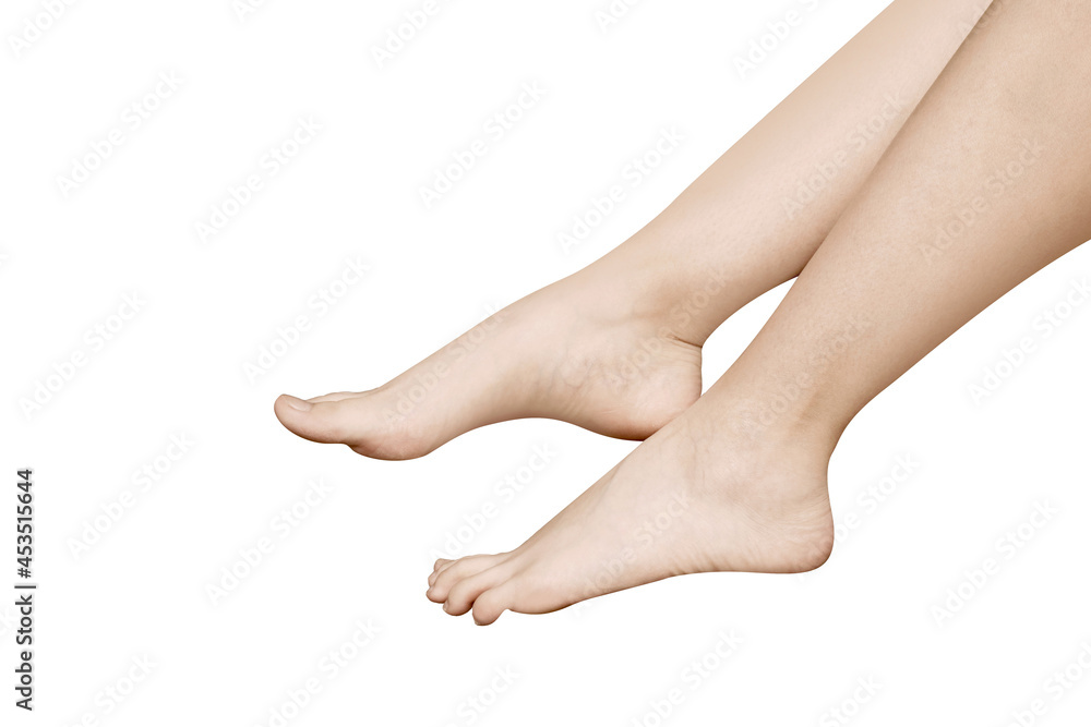 Smooth female legs on a white background. Healthy feet. Epilation, sugaring.