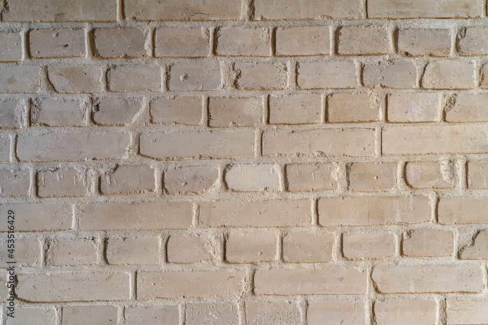 A bright brick wall in an old tenement house. August 2021. A bright brick wall in an old tenement house. August 2021.