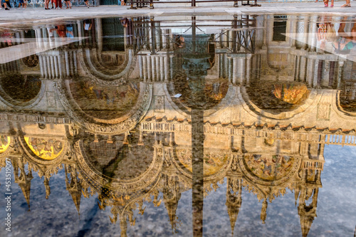 Reflection of St. Mark's Basilika in Venice / Italy