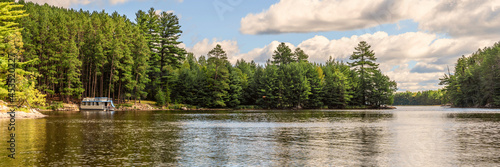 People are enjoying fishing and boating on a sunny day on Crane Lake, Voyageurs National Park, Minnesota