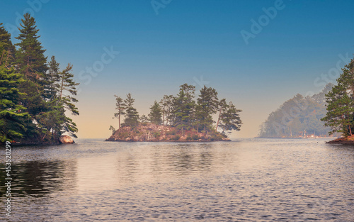 People are enjoying fishing and boating under sunset on Crane Lake, Voyageurs National Park, Minnesota photo