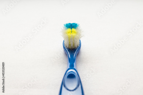 Worn out used toothbrush. Time to replace your toothbrush. Oral care, dental concept