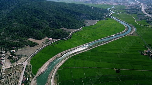 Farmland irrigation canal. A river that runs through the farmland. photo