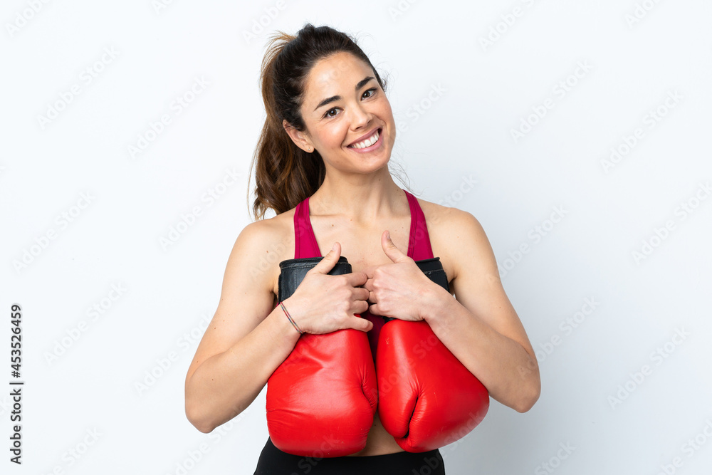 Sport woman over isolated white background with boxing gloves Sport woman over isolated white background with boxing gloves