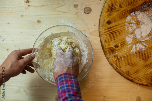 Man prepares dough