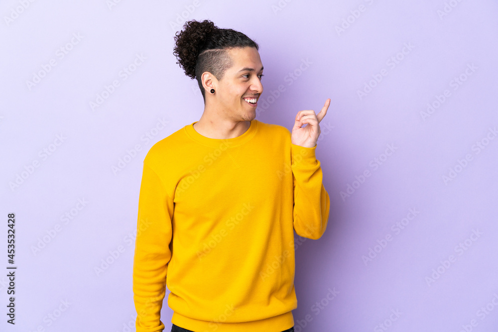 Caucasian man over isolated background intending to realizes the solution while lifting a finger up Caucasian man over isolated background intending to realizes the solution while lifting a finger up