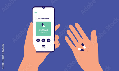 A Person's Hand Holding Medicine Pills And Smartphone With Pill Reminder Mobile App. Medication Tracker.