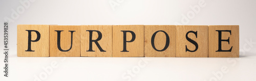 The word purpose was created from wooden cubes. business and planning concept.