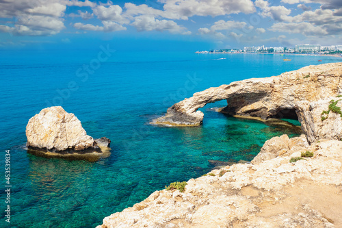 Cyprus landscape. Ayia Napa rocks. bridge of love. Rocky arch in mediterranean sea. Cape Greco panorama. Natural attractions of Cyprus. Panorama of Republic of Cyprus. Turquoise water.
