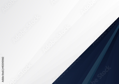 Abstract blue background in dark navy blue colors with layers of grey wave shapes in transparent design and space for text