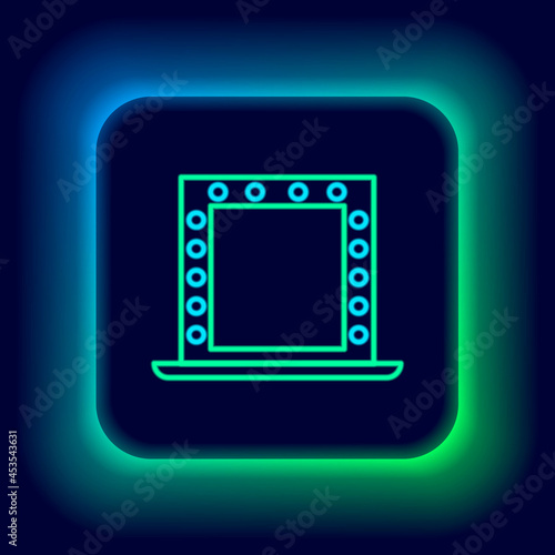 Glowing neon line Makeup mirror with lights icon isolated on black background. Colorful outline concept. Vector