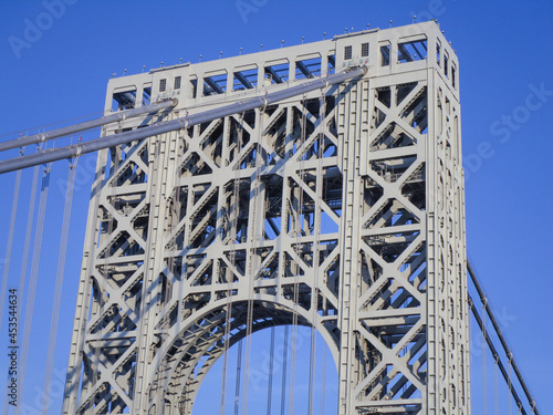 Detail of the George Washington Bridge (1931), a double-decked suspension bridge spanning the Hudson River between Manhattan, New York, and Fort Lee, New Jersey.