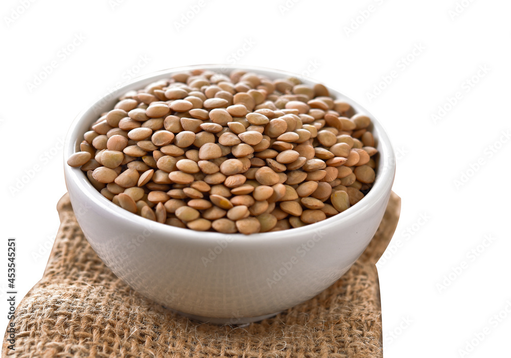 lentils in white bowl on white background lentils in white bowl on white background