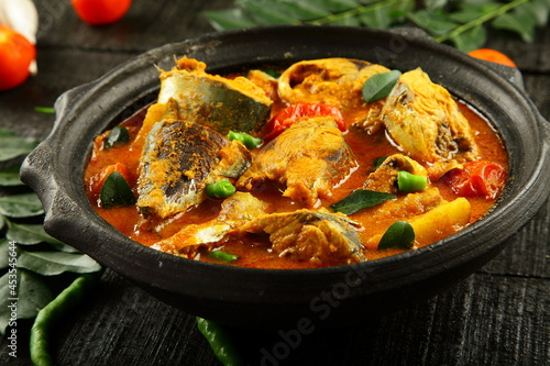 Goan cuisine, Homemade delicious coconut milk, green mango fish curry from Goa, photo