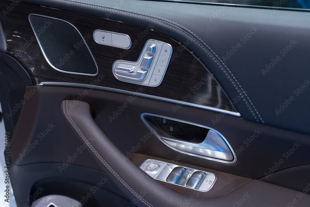 Close up of buttons for adjusting seat position of new modern car. Close up of buttons for adjusting seat position of new modern car.