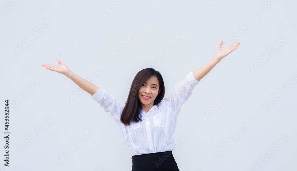 close up attractive adult business woman asian girl with happy and smile against white concrete wall office. close up attractive adult business woman asian girl with happy and smile against white concrete wall office.