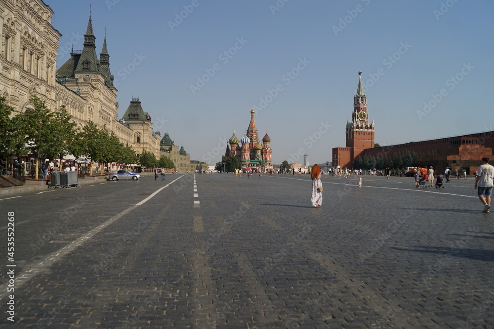 Naklejka premium Red girl on the Red Square