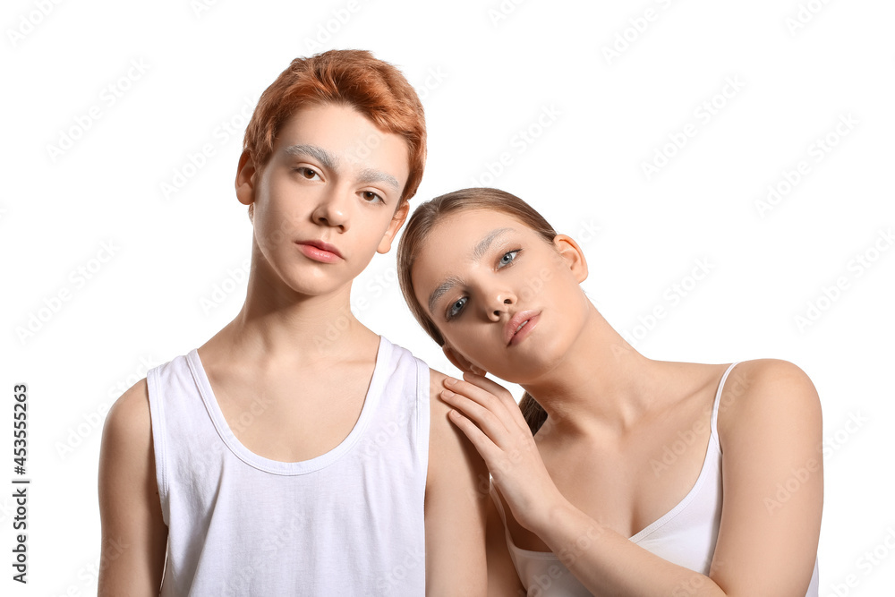 Teenagers with dyed eyebrows on white background Teenagers with dyed eyebrows on white background