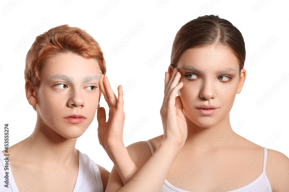 Teenagers with dyed eyebrows on white background Teenagers with dyed eyebrows on white background