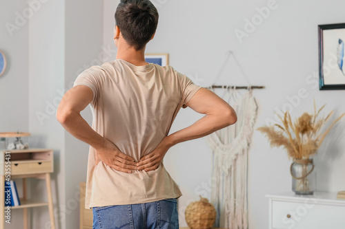 Young man suffering from ba...