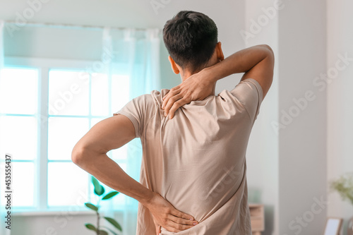 Young man suffering from ba...