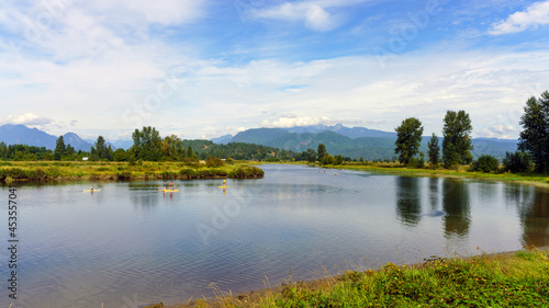 Scenic Alouette River, near Pitt Meadows, BC, a popular venue for kayakers, canoeists and paddleboarders with spectacular mountain backdrop.