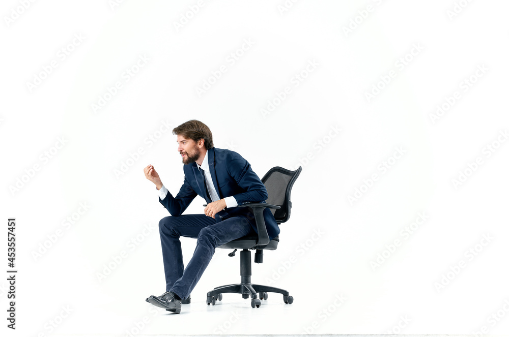 business man sitting in a chair office work light background business man sitting in a chair office work light background