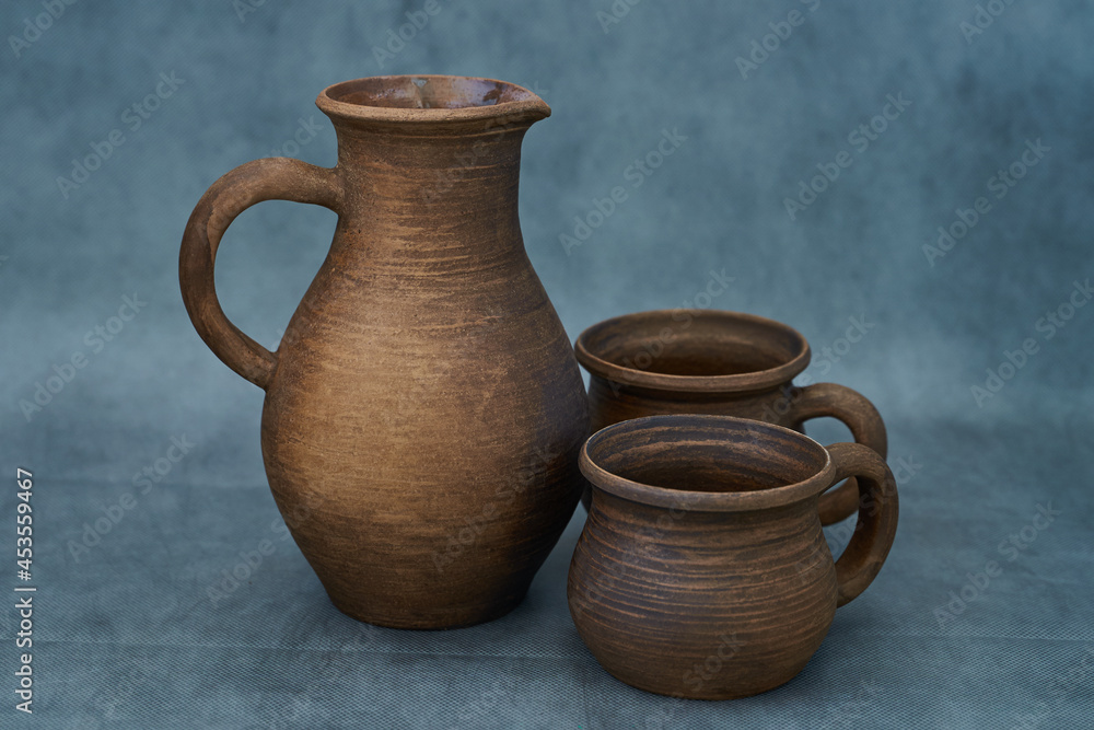  Ceramics, a ceramic product made with your own hands, made on a potter's wheel, a jug, a mug, clay.     