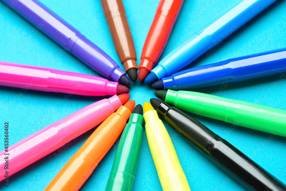 Fotografie Colorful markers on color background