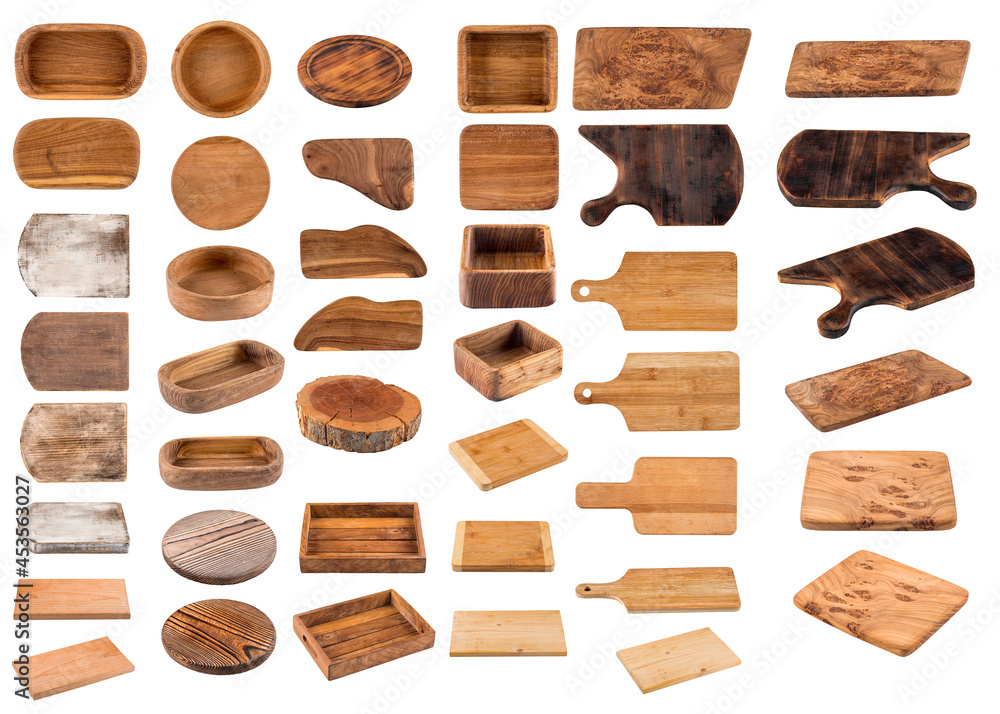 Isolated woodIsolated variety of wooden cookware boards collection set collageen cookware boards collection collage. High quality photo