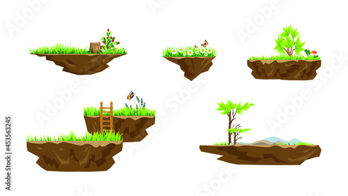 Set of game elements. Vector platforms with grass, flowers, trees, bushes, mushrooms, butterflies and mountains for mobile game. 