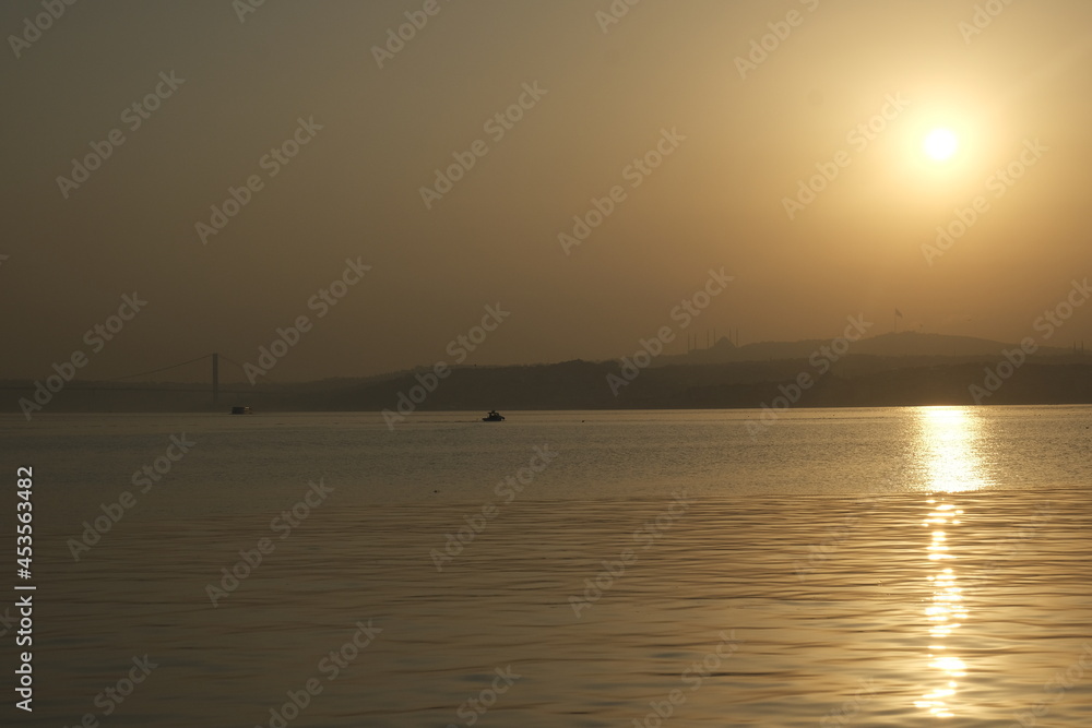 Naklejka premium sunset over the sea