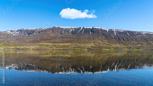 Lake Ljosavatn, also called mirror lake in North Iceland near Akureyri on a summer day. Reflection of the mount is clearly seen on the lake