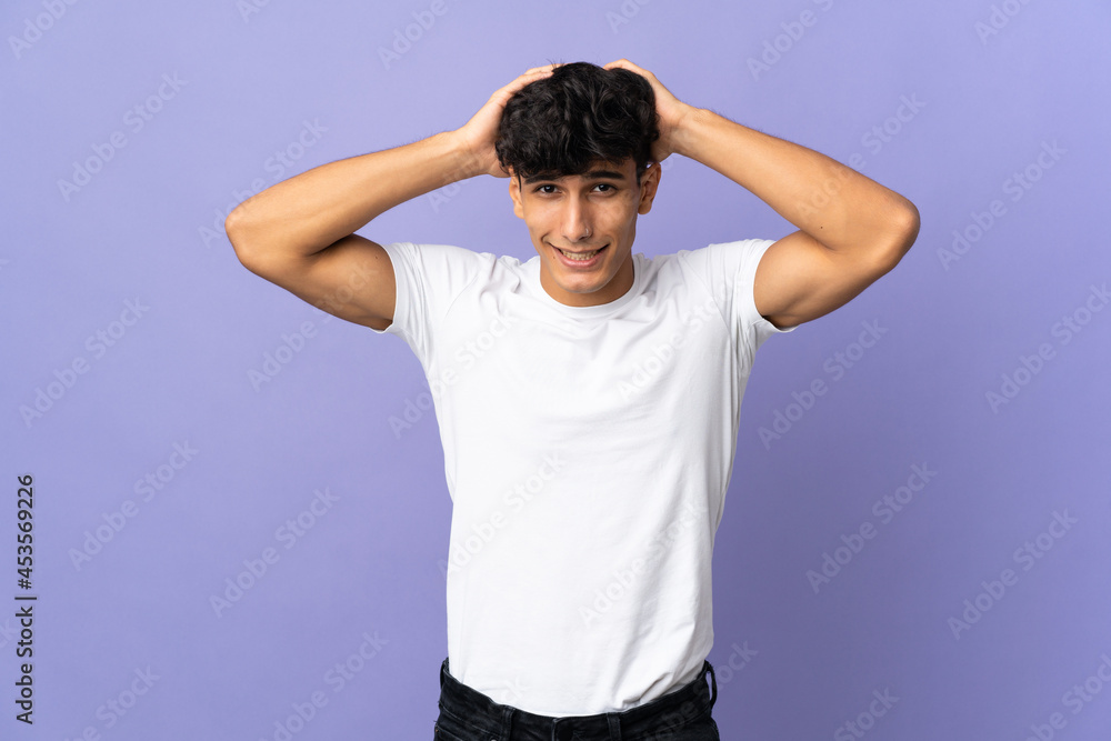 Young Argentinian man isolated on background doing nervous gesture Young Argentinian man isolated on background doing nervous gesture
