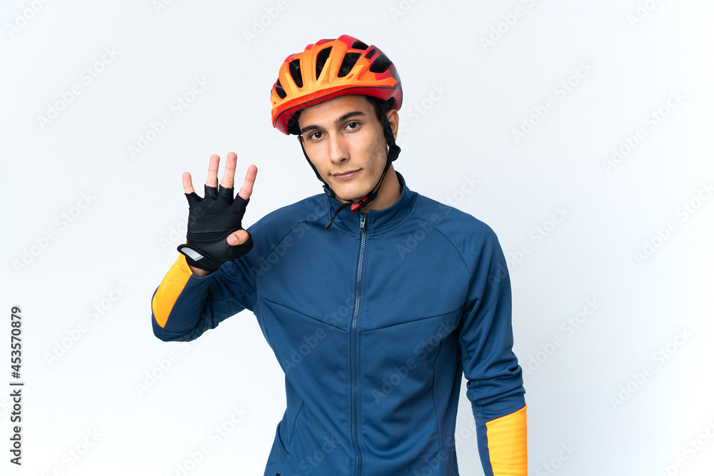Young cyclist man isolated on background happy and counting four with fingers